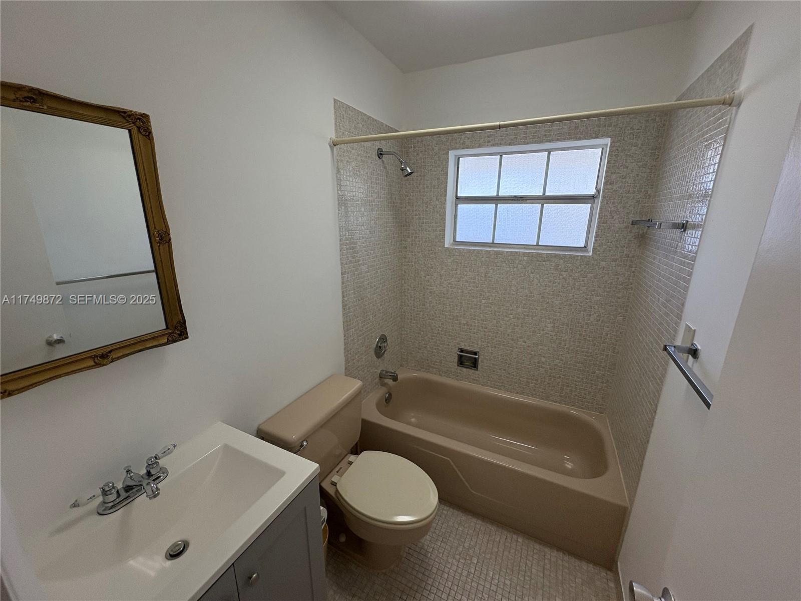 11260 Southwest 172nd Street, Unit II2831 Miami, FL 33157 - Photo 13 of 24 a bathroom with a sink toilet and shower