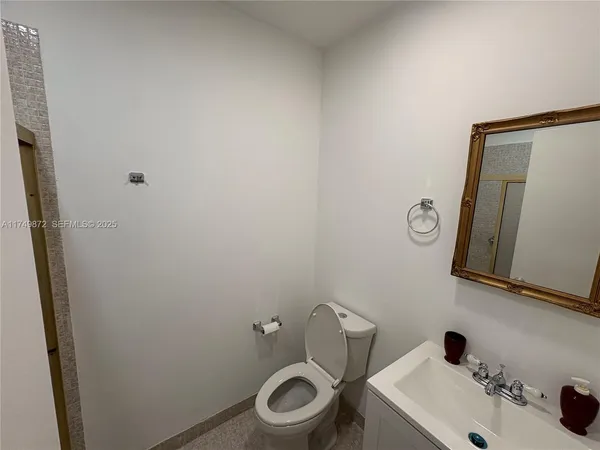 a bathroom with a sink and a toilet