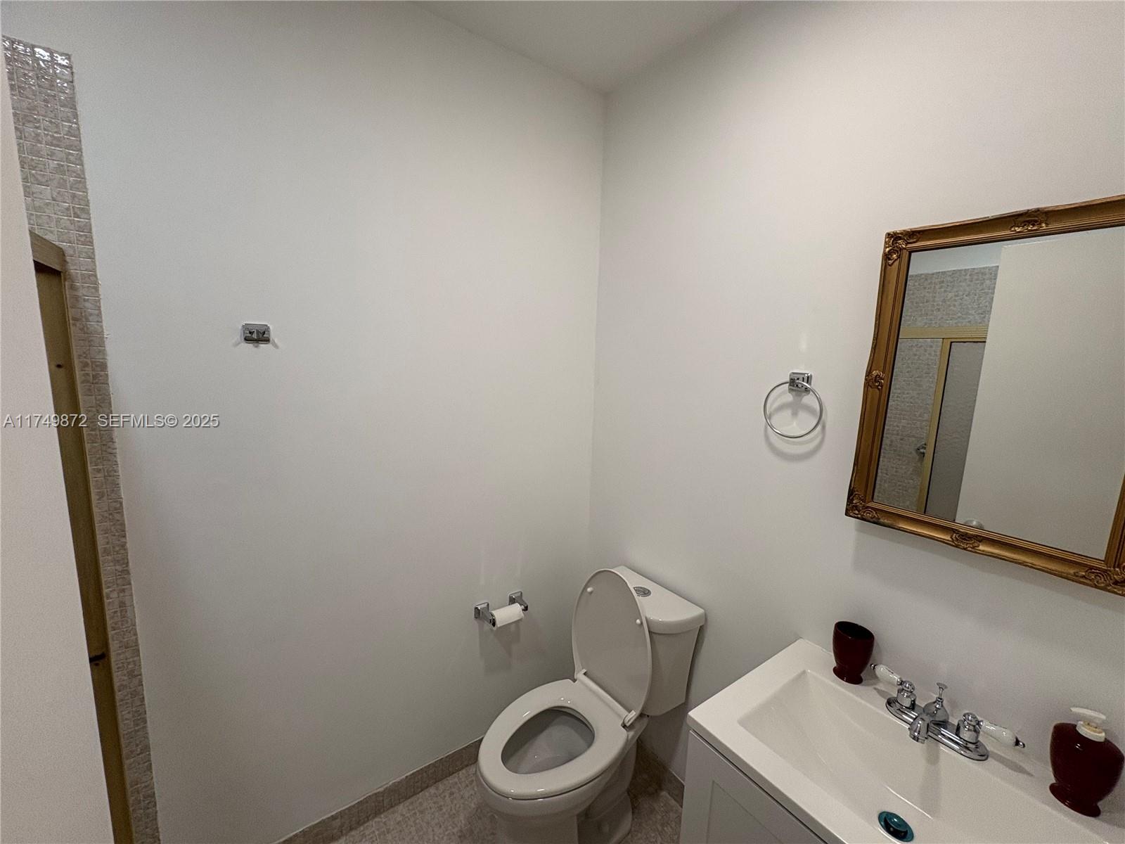 11260 Southwest 172nd Street, Unit II2831 Miami, FL 33157 - Photo 16 of 24 a bathroom with a sink and a toilet