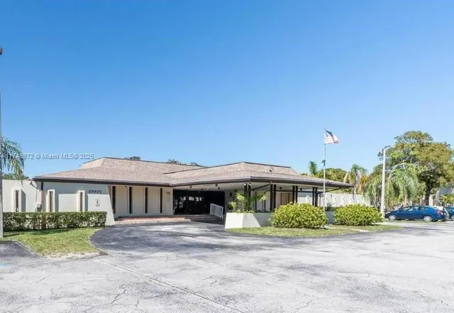 a view of a playground with basketball court