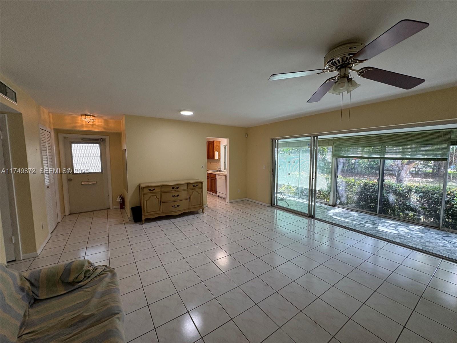 11260 Southwest 172nd Street, Unit II2831 Miami, FL 33157 - Photo 6 of 24 a view of an empty room and window