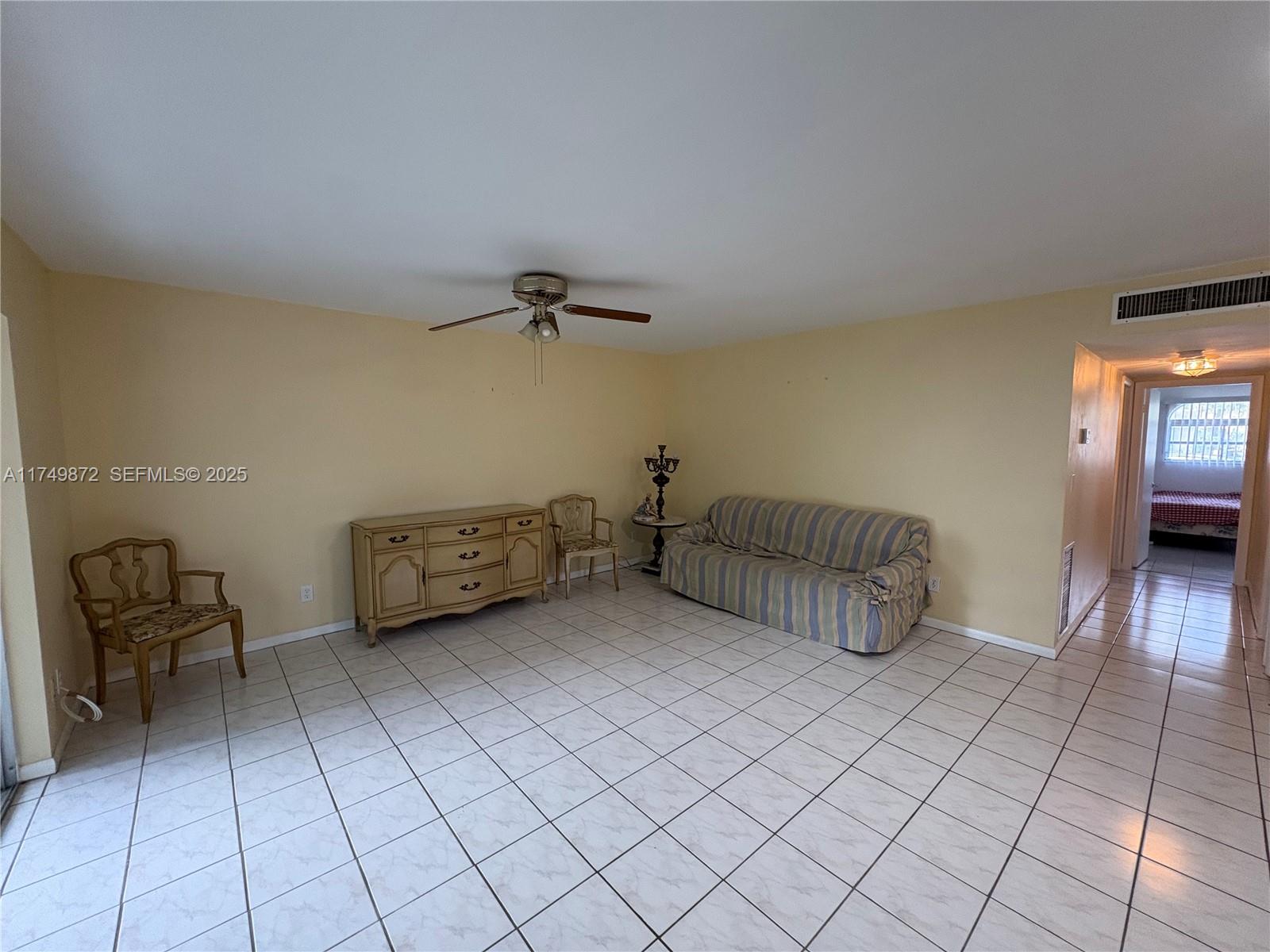 11260 Southwest 172nd Street, Unit II2831 Miami, FL 33157 - Photo 8 of 24 a view of a livingroom with furniture