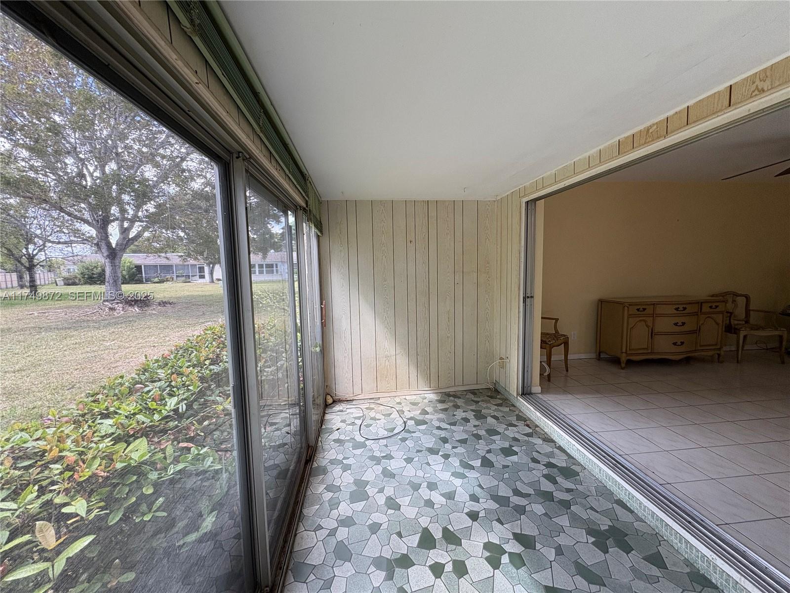 11260 Southwest 172nd Street, Unit II2831 Miami, FL 33157 - Photo 9 of 24 a view of a porch