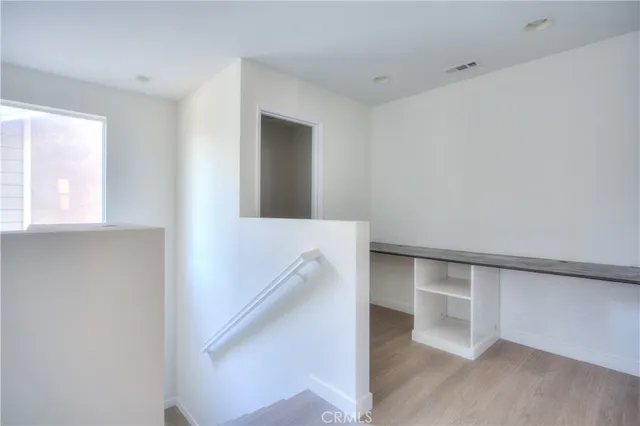 a view of an empty walk in closet