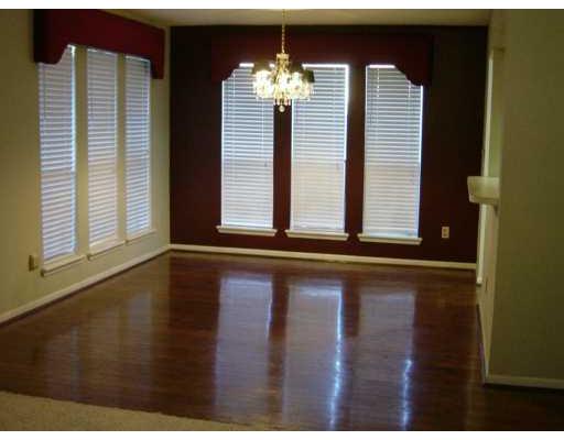 4558 Moonlake Ridge Drive Corpus Christi, TX 78413 - Photo 2 of 5 a view of a room with a large window and chandelier