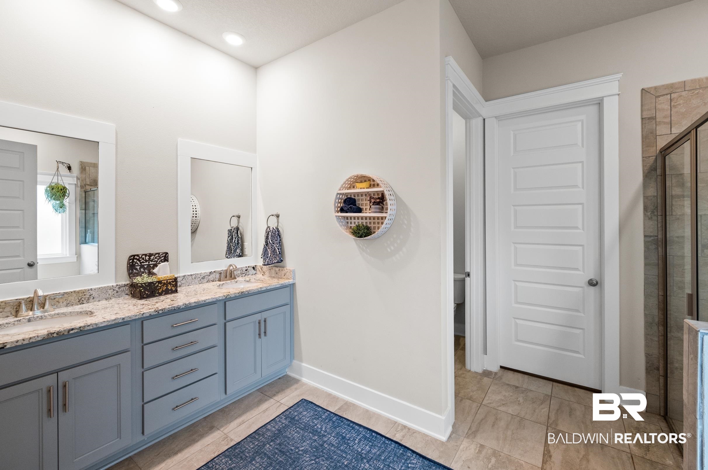 31355 Limpkin Street Daphne, AL 36527 - Photo 34 of 57 Bathroom featuring vanity, toilet, and walk in shower