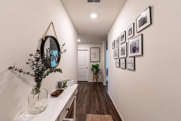 a view of entryway with wooden floor