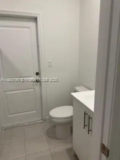 a bathroom with a toilet and a sink