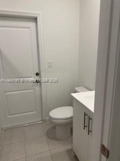 834 Southeast 26th Street, Unit STUDIO Homestead, FL 33035 - Photo 7 of 11 a bathroom with a toilet and a sink