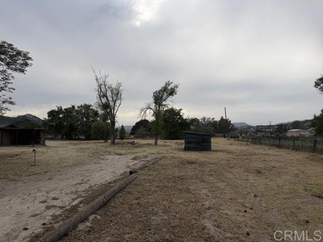1366 Far Valley Road Campo, CA 91906 - Photo 14 of 26 a view of dirt yard with large trees