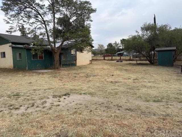 1366 Far Valley Road Campo, CA 91906 - Photo 20 of 26 a backyard of a house with lots of green space