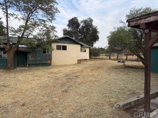 1366 Far Valley Road Campo, CA 91906 - Photo 23 of 26 a house with trees in front of it