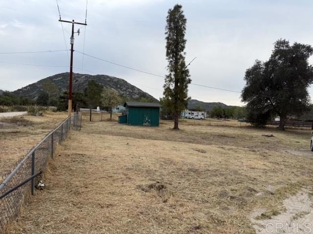 1366 Far Valley Road Campo, CA 91906 - Photo 26 of 26 a view of a dry yard with an trees
