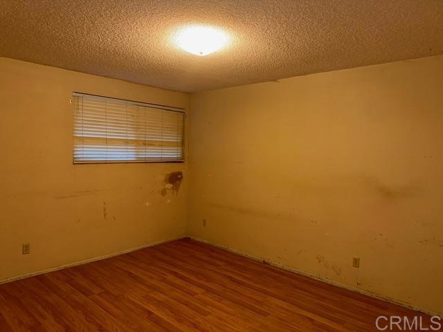 1366 Far Valley Road Campo, CA 91906 - Photo 5 of 26 a view of empty room with wooden floor