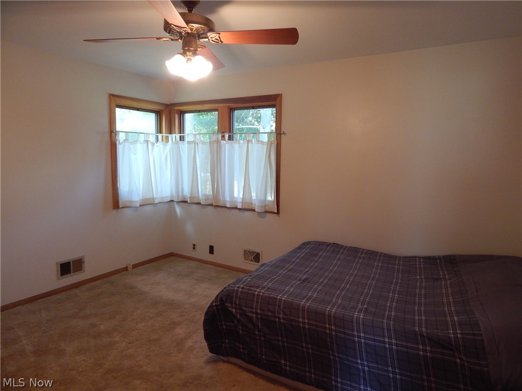 2100 West Sprague Road Cleveland, OH 44134 - Photo 19 of 34 Owners Bedroom has ample closets and Ceiling fan.