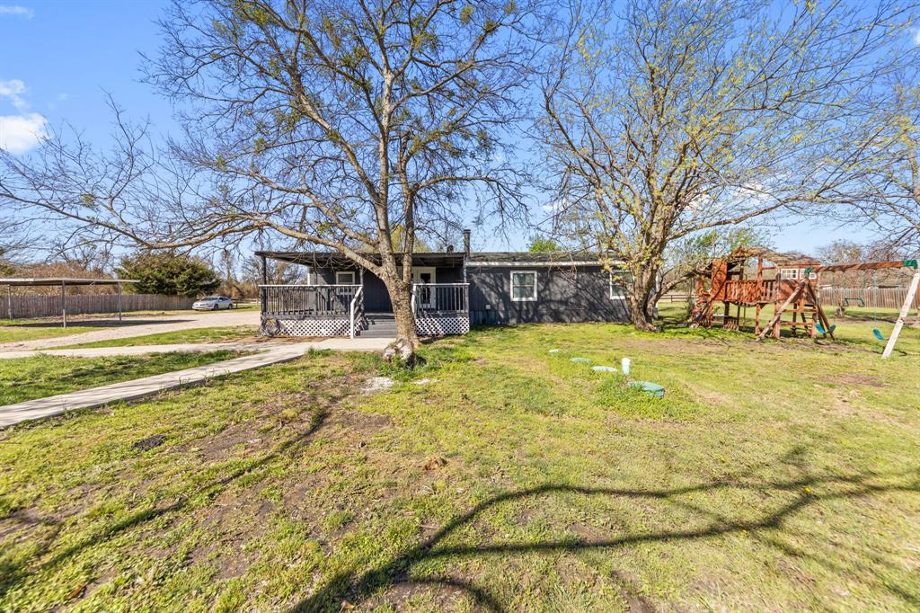 734 Northfork Road Royse City, TX 75189 - Photo 26 of 35 a view of yard with swimming pool