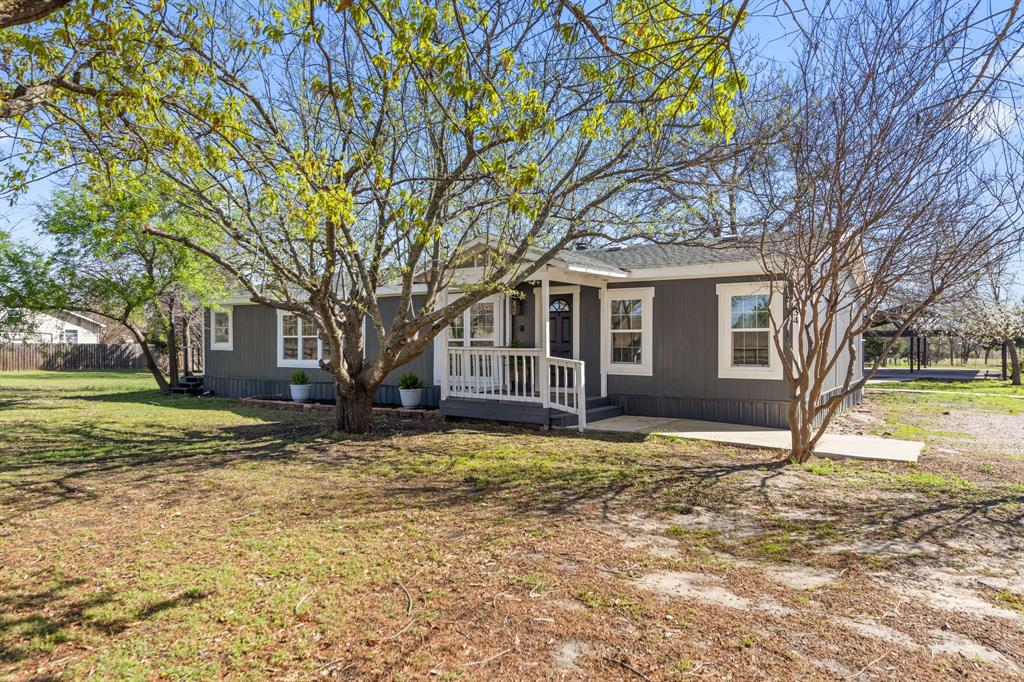 734 Northfork Road Royse City, TX 75189 - Photo 3 of 35 a view of a house with a yard covered in snow