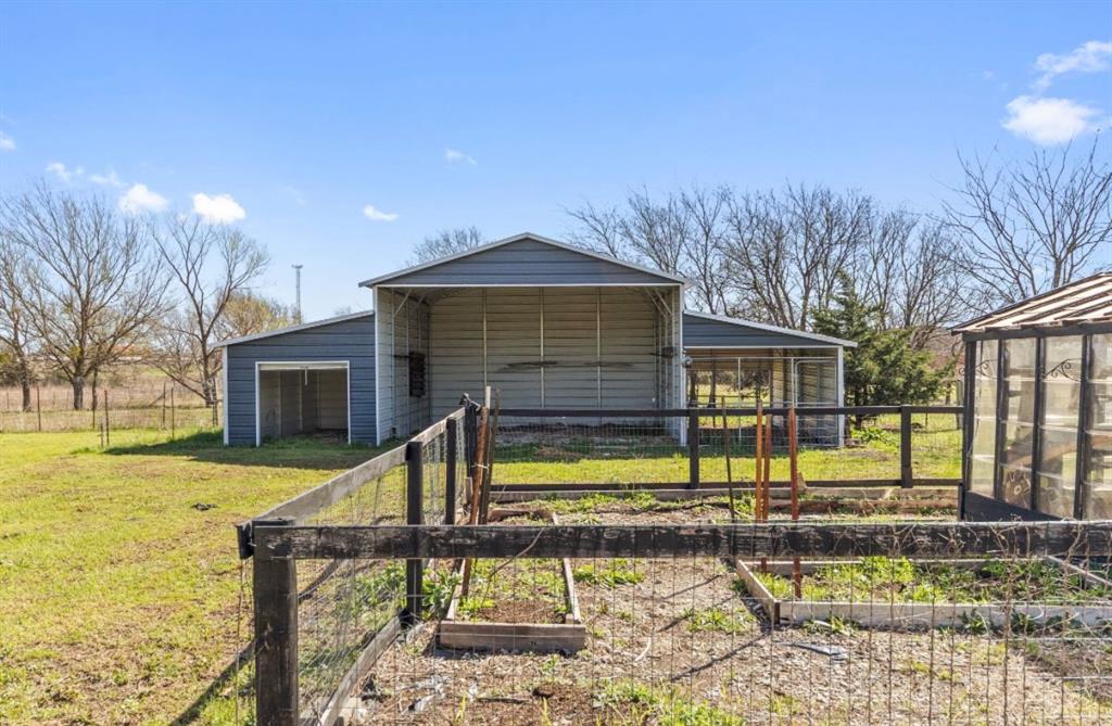 734 Northfork Road Royse City, TX 75189 - Photo 33 of 35 a front view of a house with garden