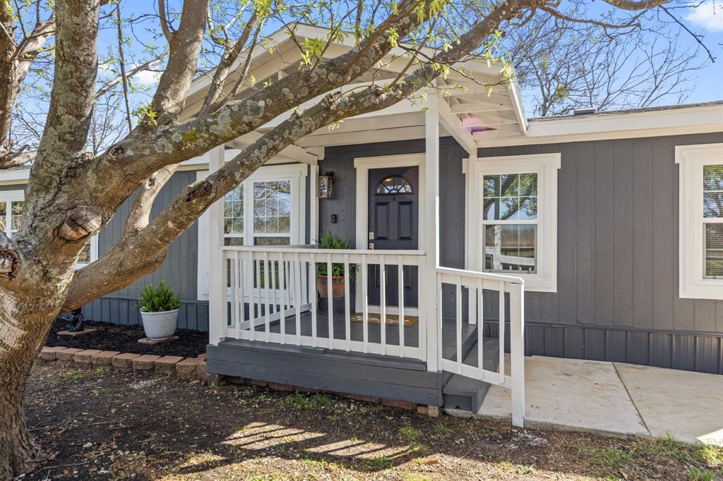 734 Northfork Road Royse City, TX 75189 - Photo 4 of 35 a view of a house with a yard
