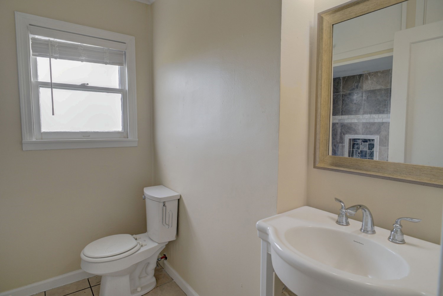 2940 Rabbs Prairie Road La Grange, TX 78945 - Photo 24 of 39 a white toilet sitting next to a bathroom sink