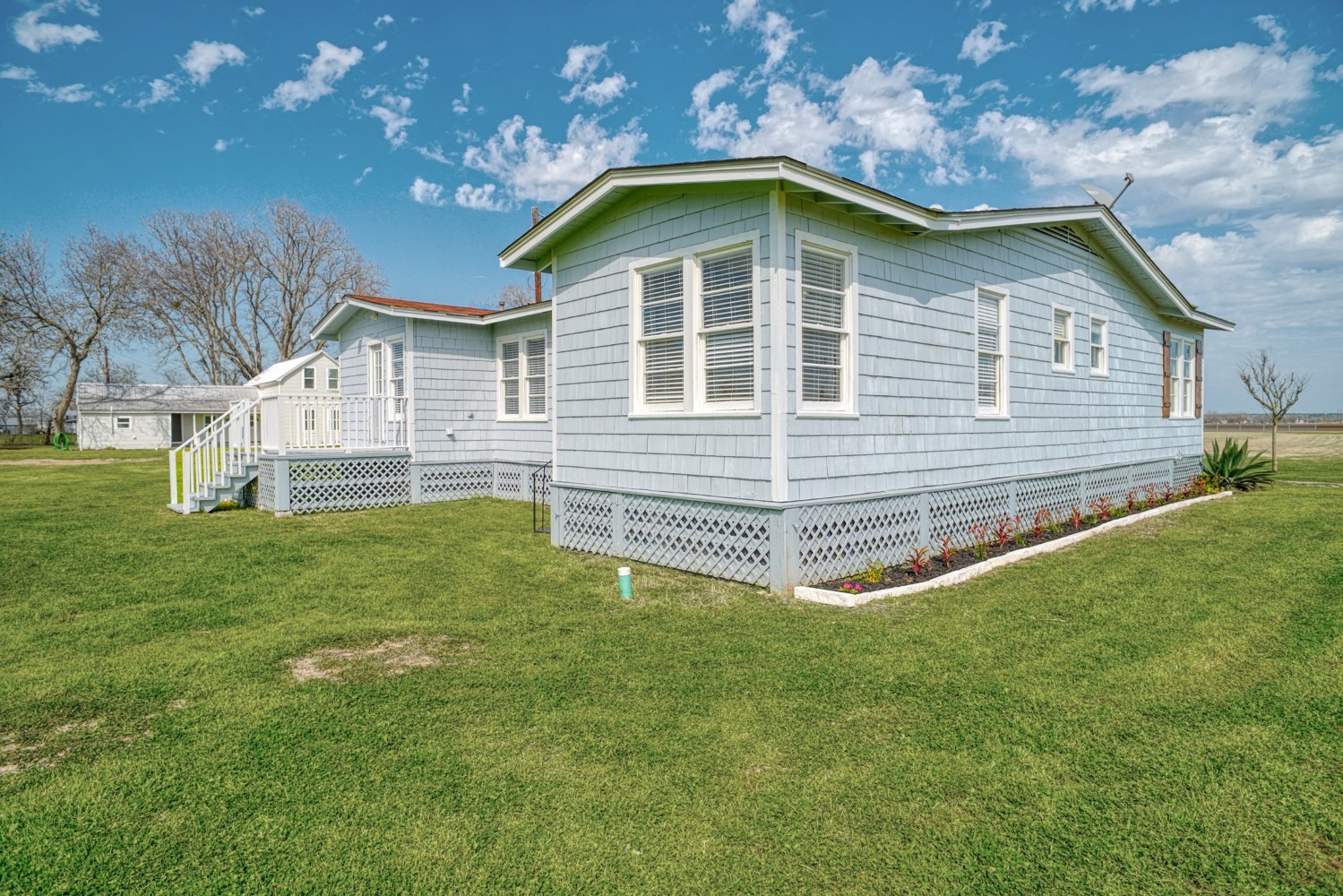 2940 Rabbs Prairie Road La Grange, TX 78945 - Photo 25 of 39 a front view of a house with a garden