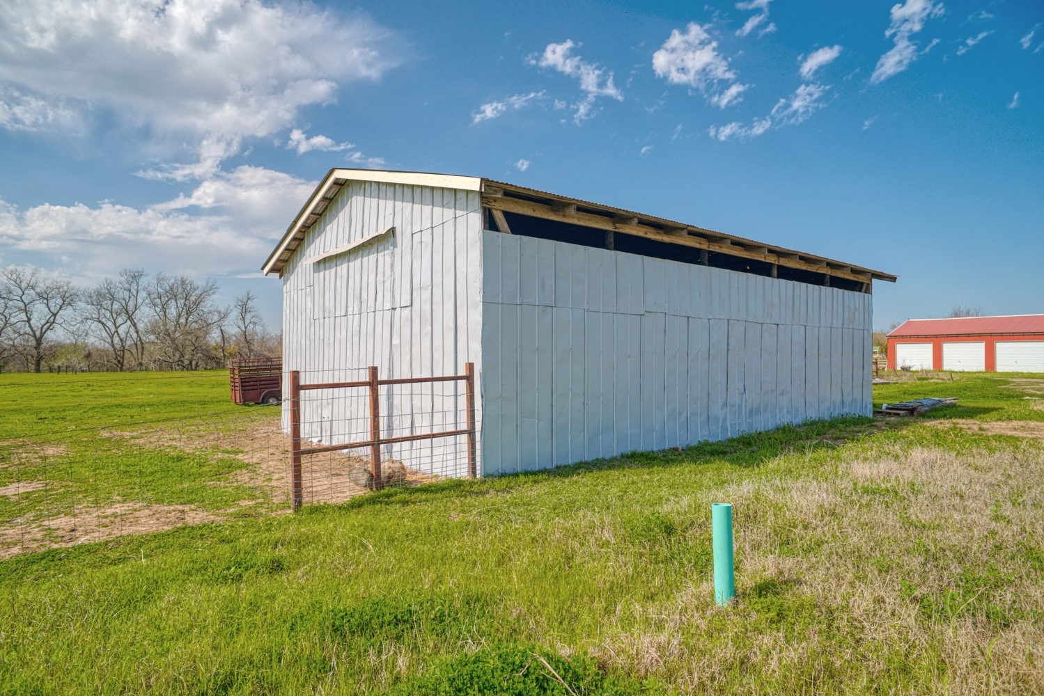 2940 Rabbs Prairie Road La Grange, TX 78945 - Photo 28 of 39 a backyard of a house with lots of green space