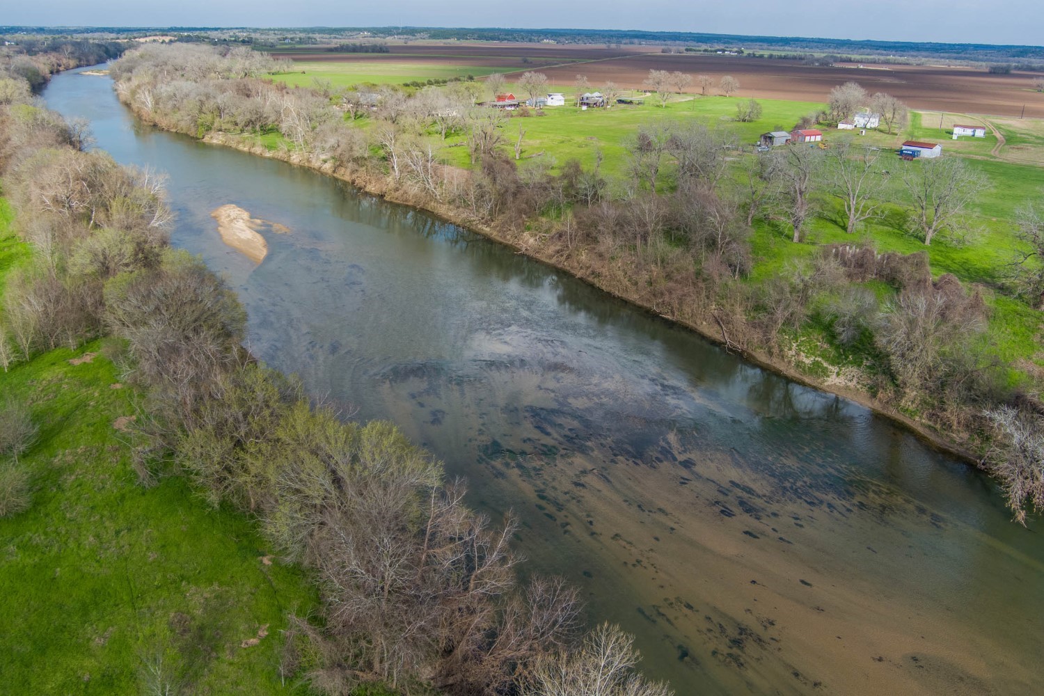 2940 Rabbs Prairie Road La Grange, TX 78945 - Photo 29 of 39 a view of a lake from a yard