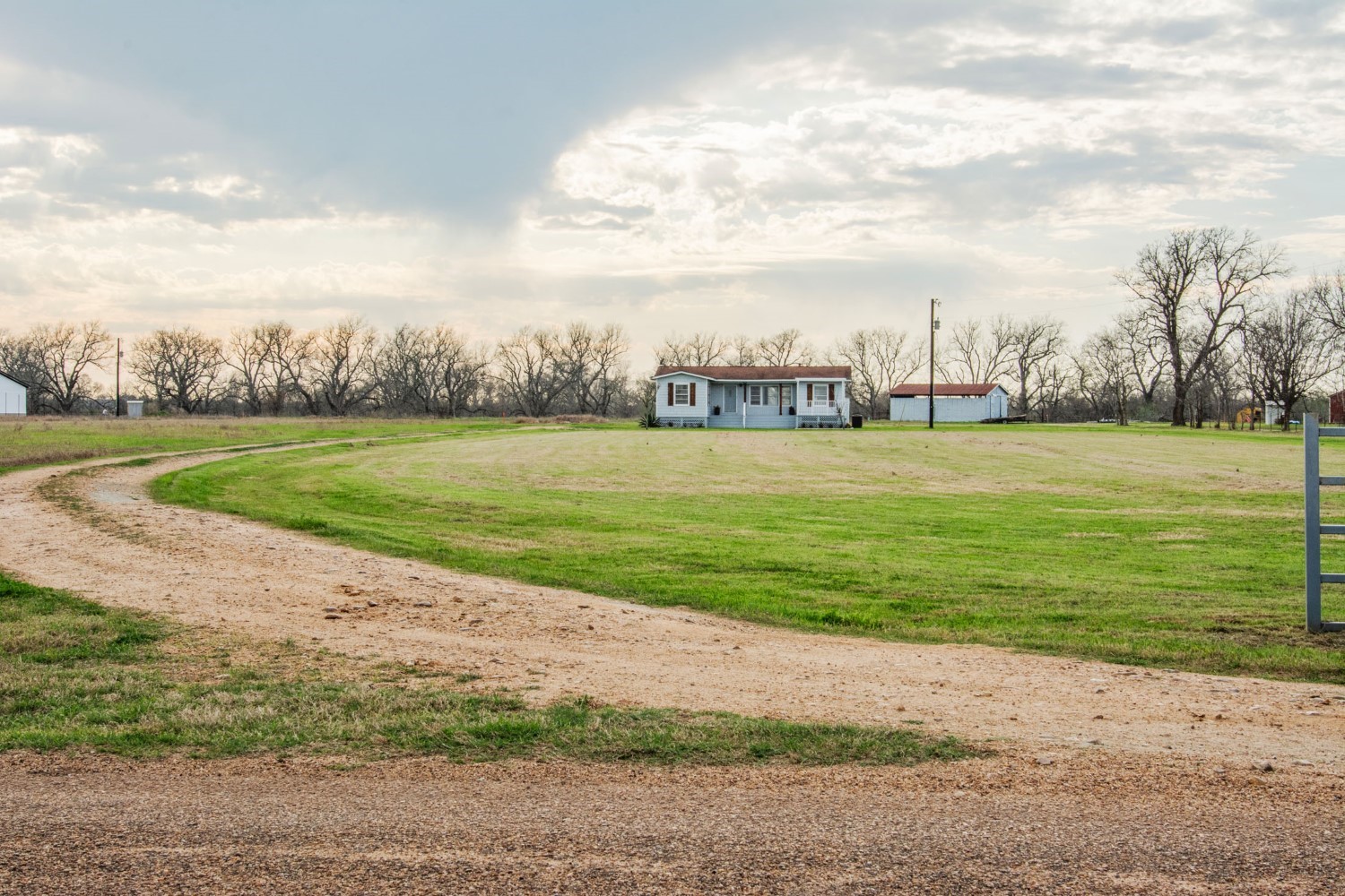 2940 Rabbs Prairie Road La Grange, TX 78945 - Photo 3 of 39 a view of a golf course with a lake