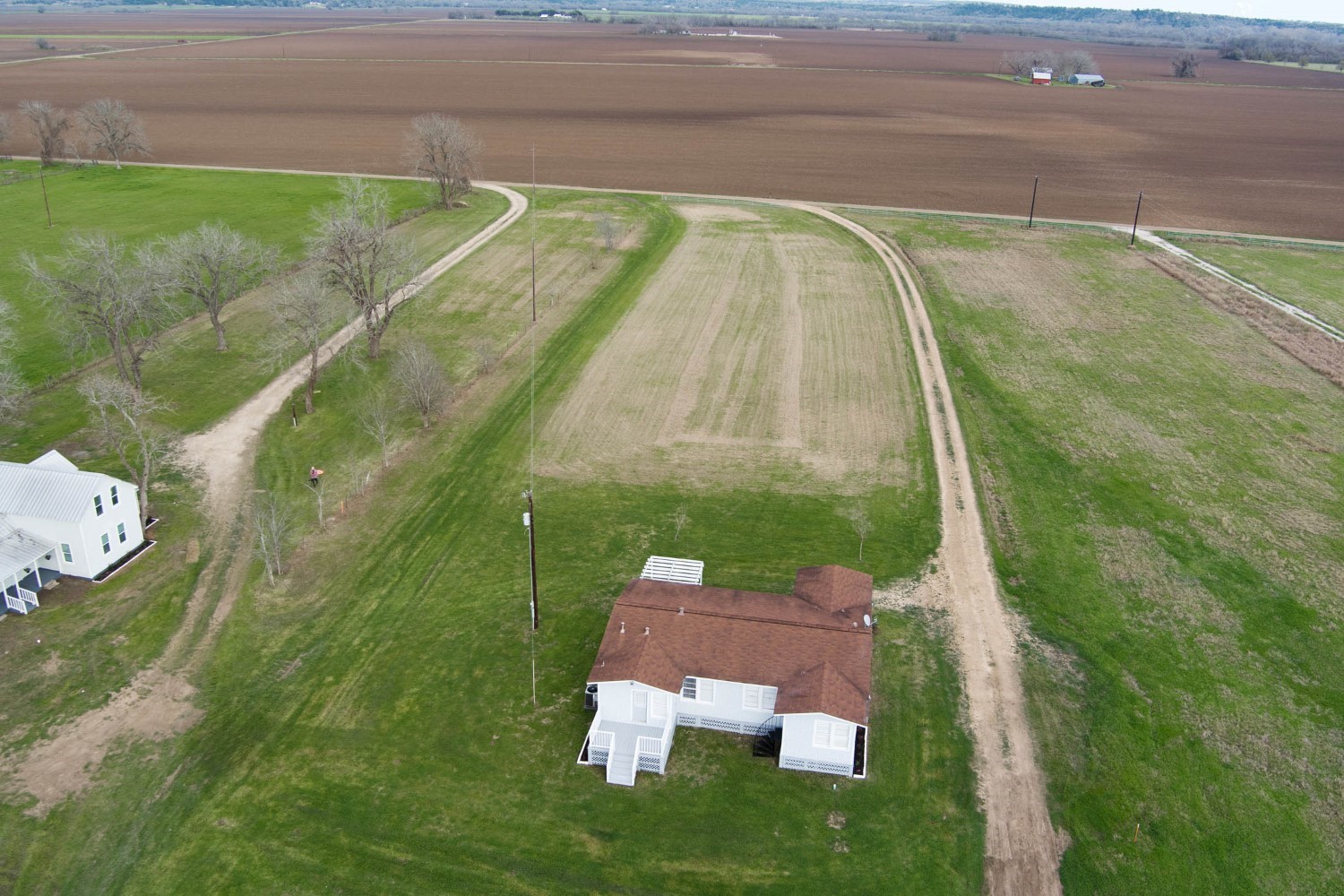 2940 Rabbs Prairie Road La Grange, TX 78945 - Photo 34 of 39 a view of a swimming pool with a yard