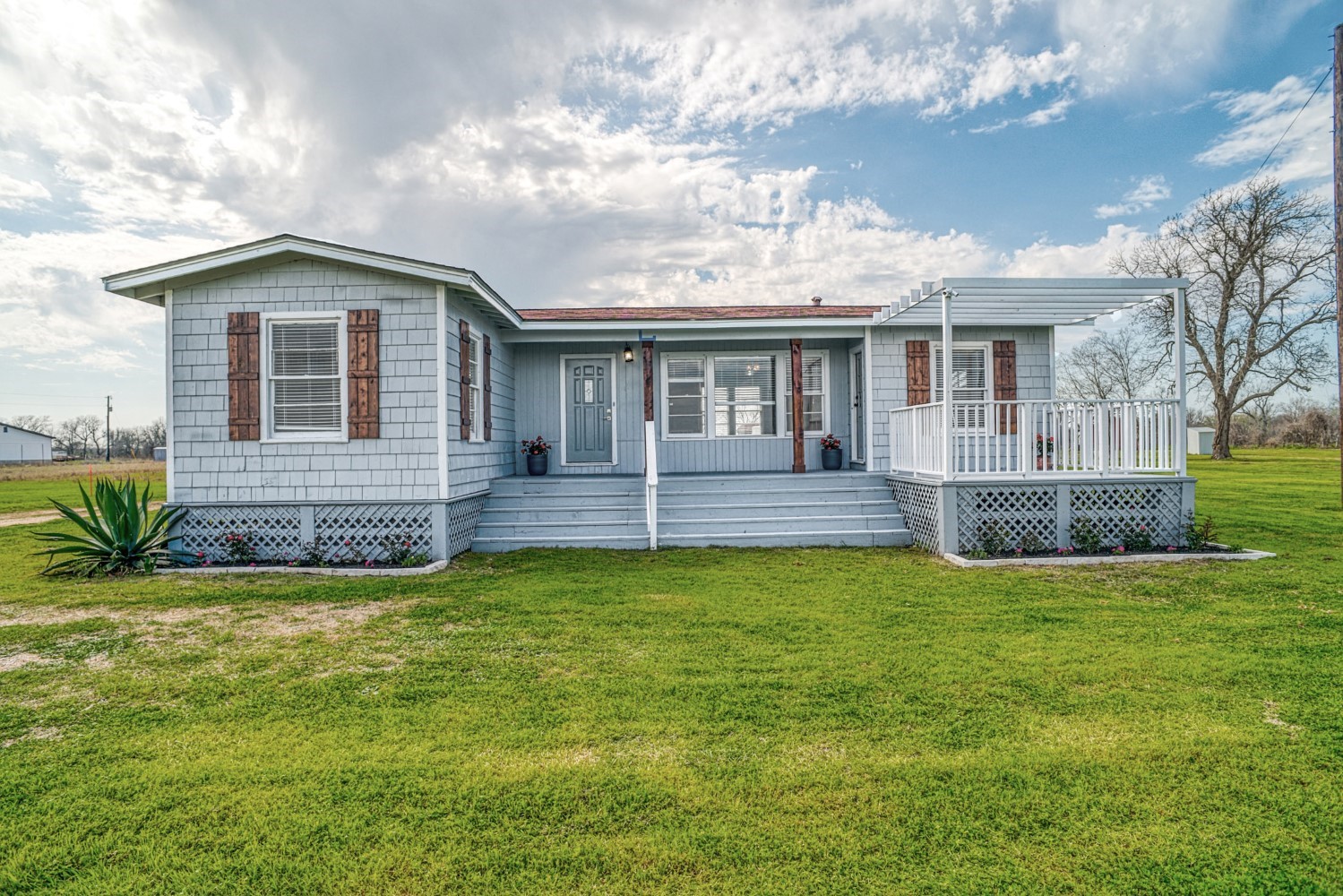 2940 Rabbs Prairie Road La Grange, TX 78945 - Photo 4 of 39 a view of a house with a swimming pool and a yard