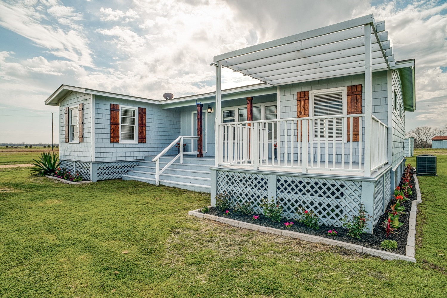 2940 Rabbs Prairie Road La Grange, TX 78945 - Photo 5 of 39 a front view of a house with garden