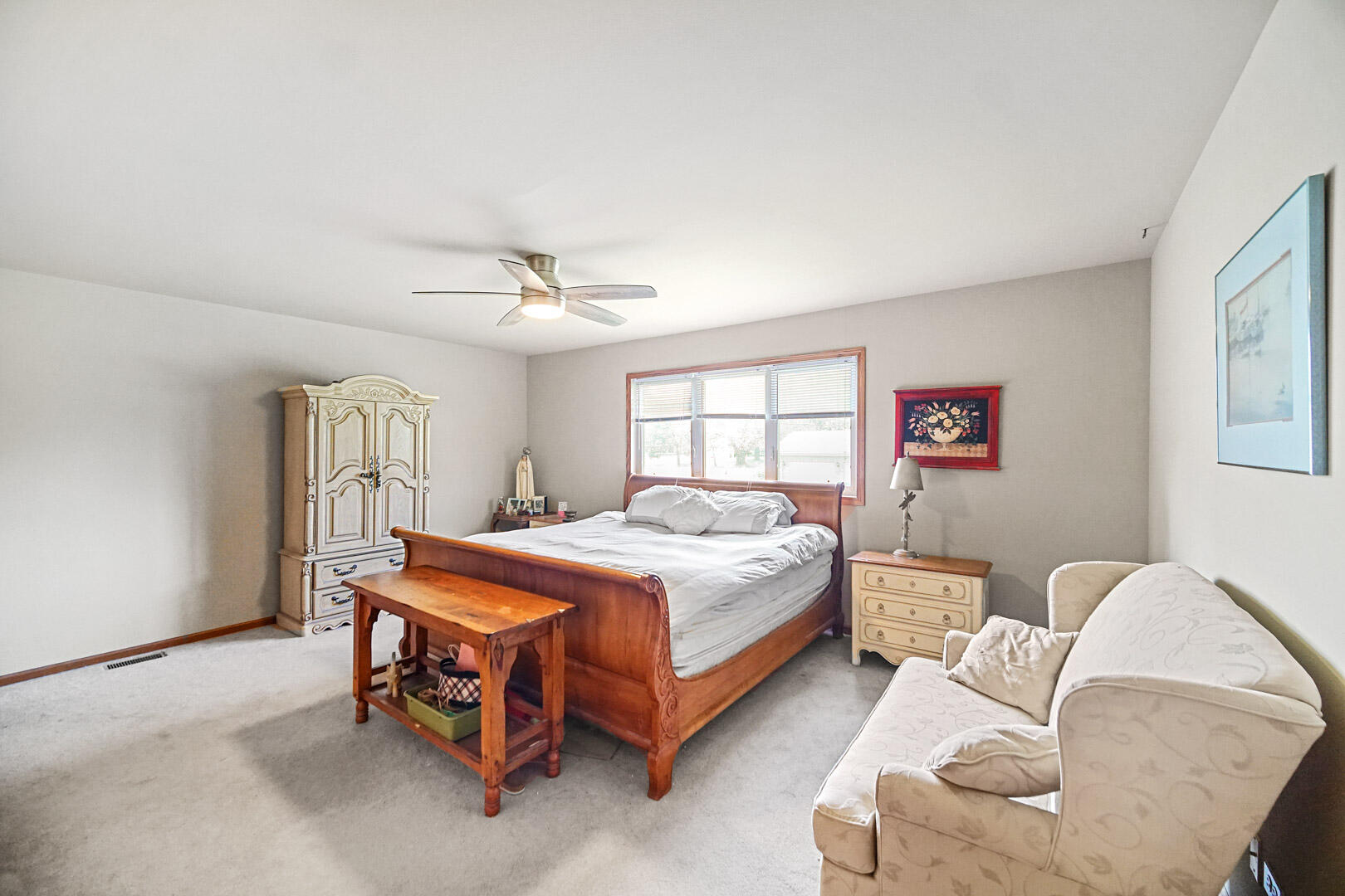 8466 Christopher Drive St. John, IN 46373 - Photo 12 of 23 a bedroom with a bed and a window