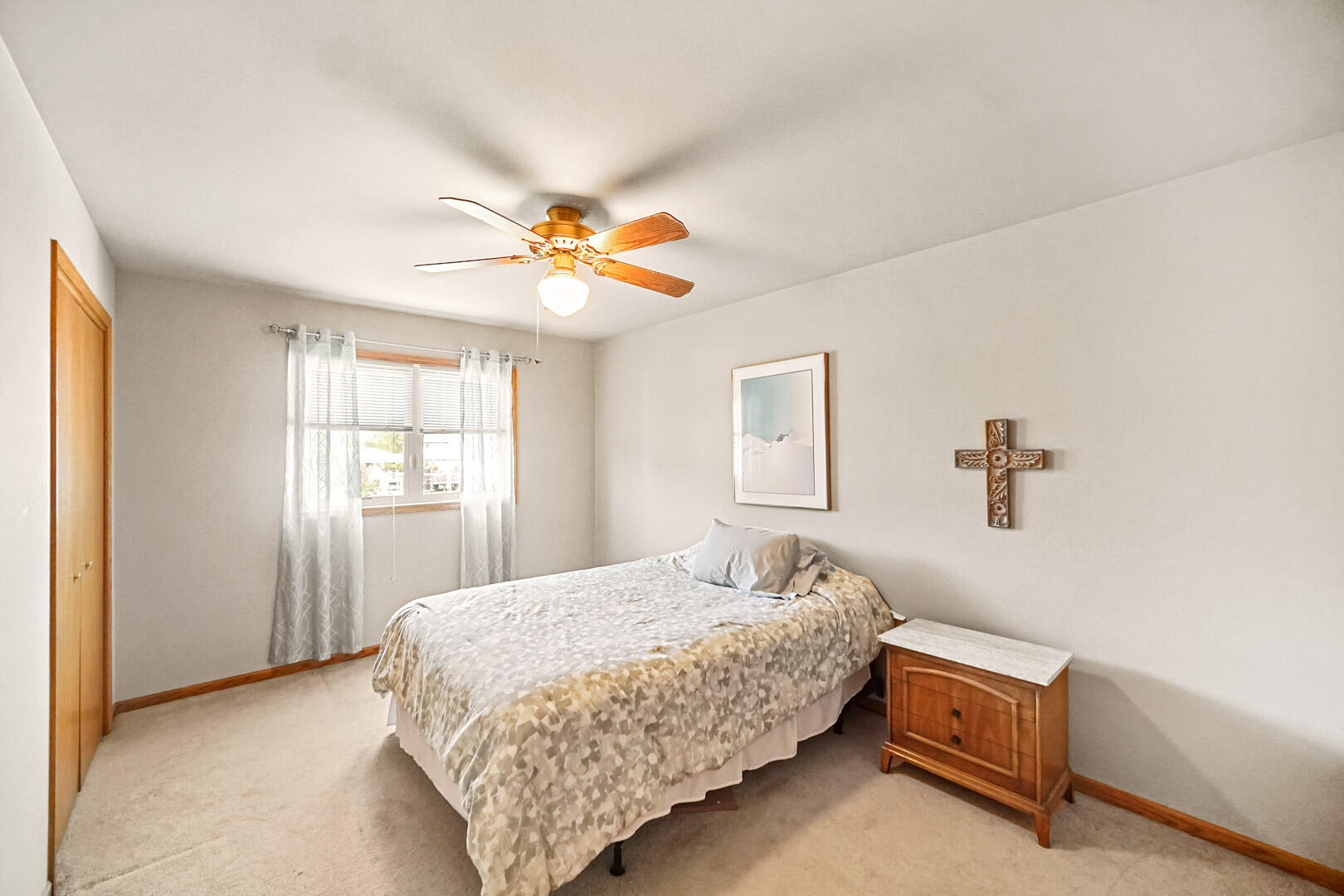 8466 Christopher Drive St. John, IN 46373 - Photo 16 of 23 a bedroom with a bed and a window