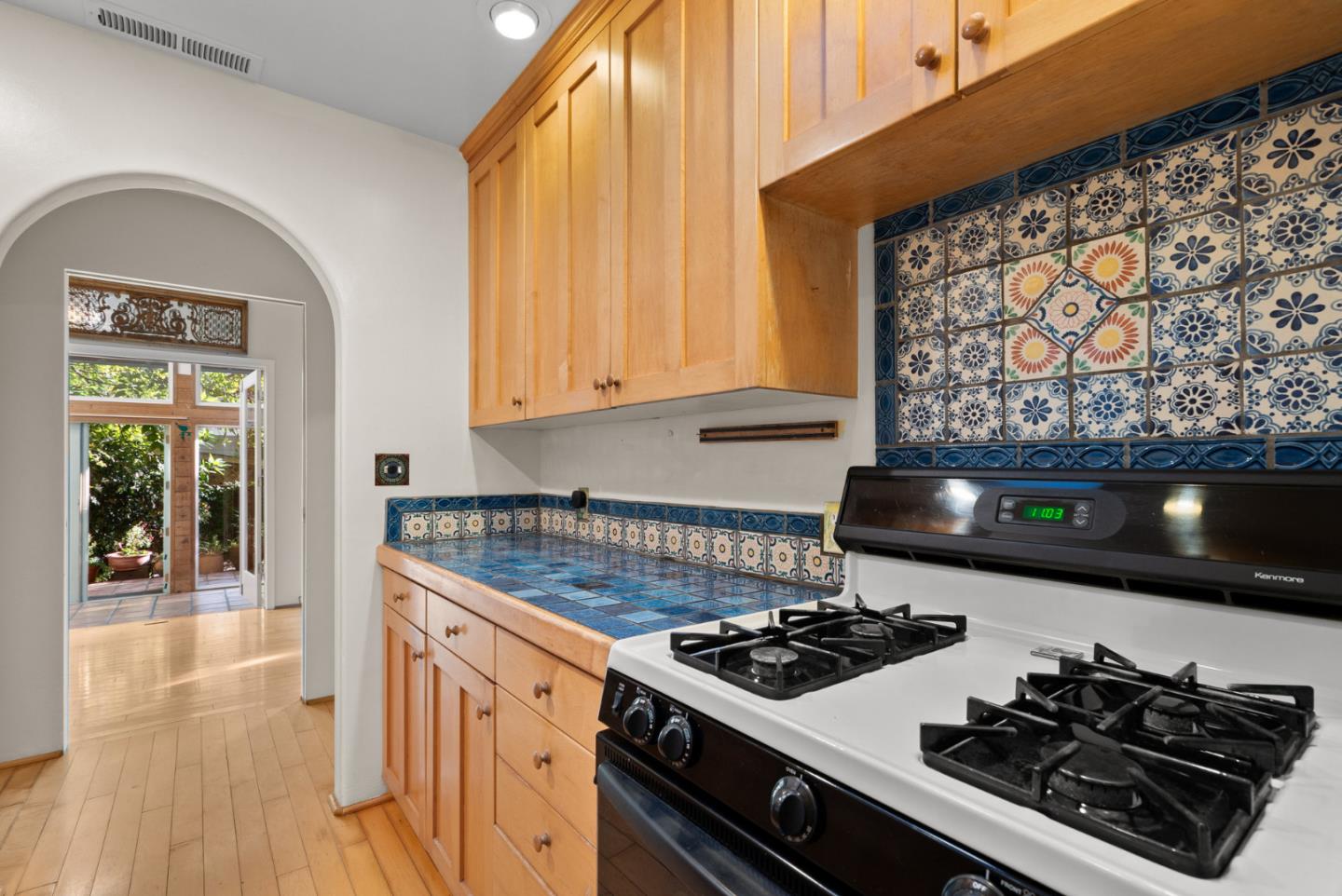 312 Elm Street Santa Cruz, CA 95060 - Photo 23 of 40 a white stove top oven sitting inside of a kitchen