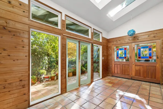 a view of a bathroom with a glass door