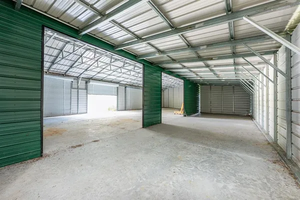 a view of a house with a garage
