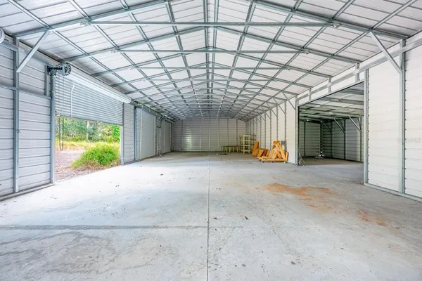 a view of a room with wooden walls and roof
