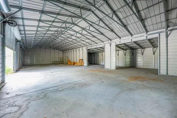 a view of a room with wooden walls