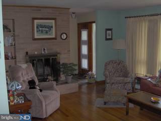 3280 Meetinghouse Road Telford, PA 18969 - Photo 2 of 6 a living room with furniture and wooden floor