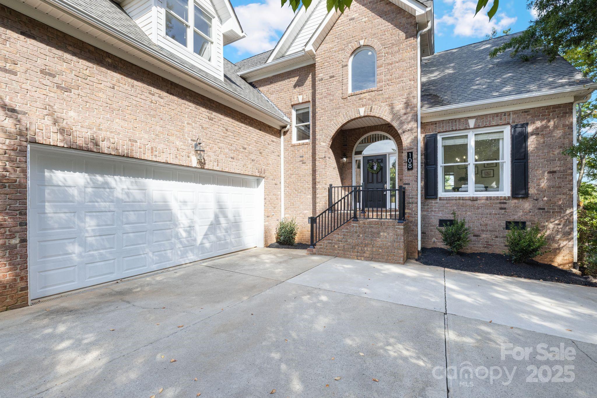 108 West Maranta Road Mooresville, NC 28117 - Photo 2 of 38 a front view of a house with garden