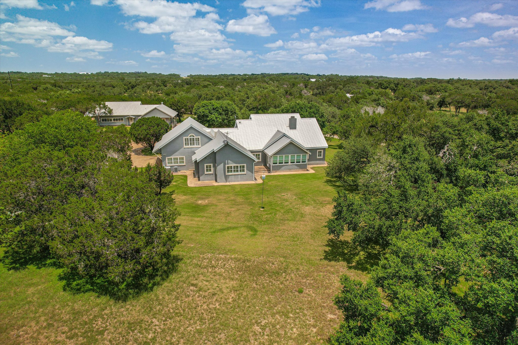 3820 River Road Wimberley, TX 78676 - Photo 23 of 37 Expansive backyard offers outdoor living options