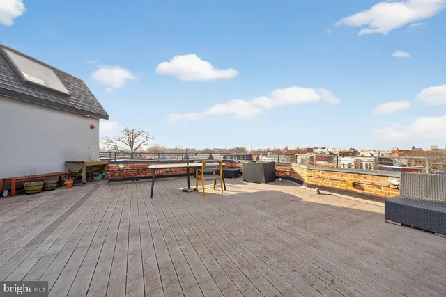 a view of a terrace with chairs