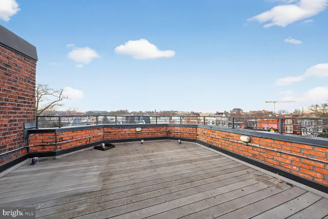 a view of city from terrace with seating space