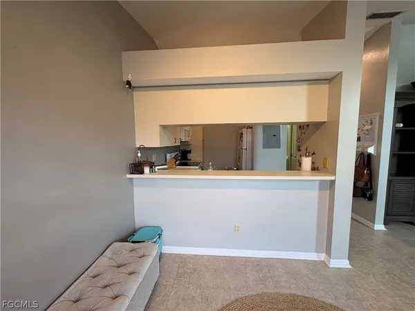 a view of kitchen and hallway