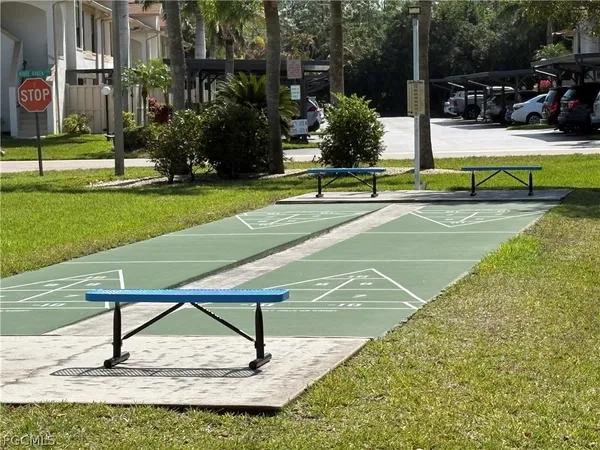 a view of a park with swings and slides