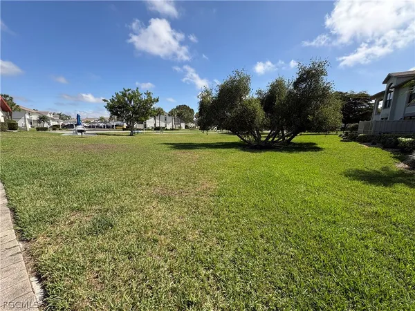 a view of a lake with houses