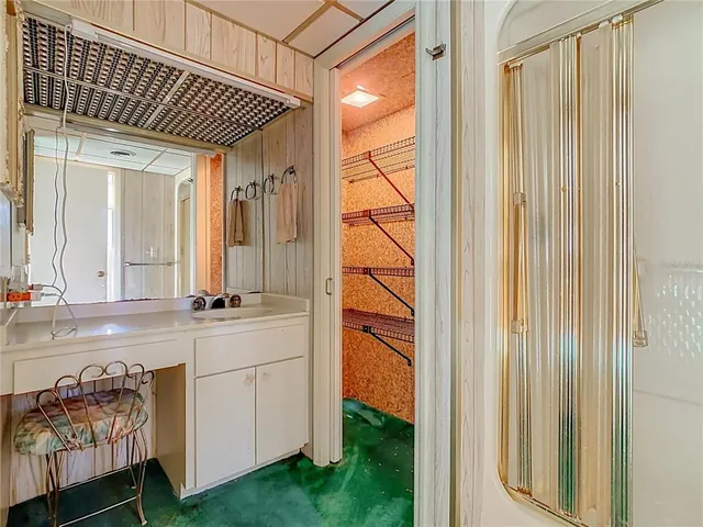 a bed room with a bed and a fish tank