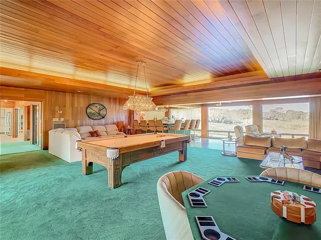 a living room with a couch and a table