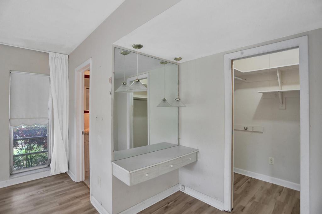 1088 Southwest 13th Place Boca Raton, FL 33486 - Photo 13 of 27 Master Walk-in Closet