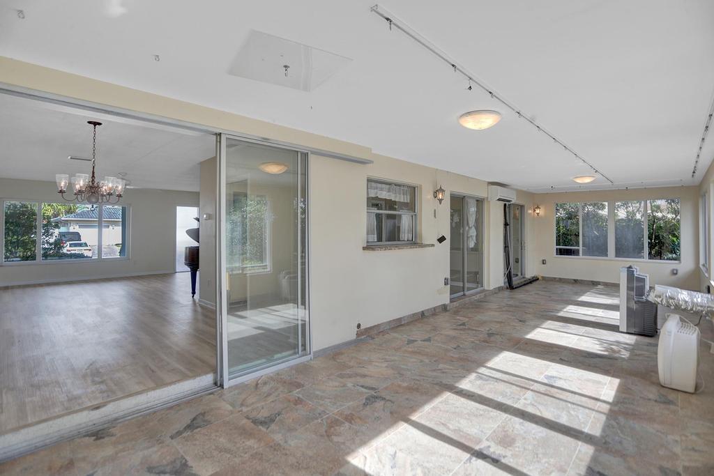 1088 Southwest 13th Place Boca Raton, FL 33486 - Photo 21 of 27 Glassed Porch
